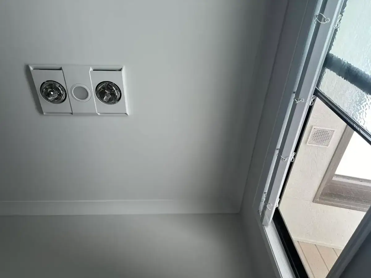 Bathroom heater, light and exhaust unit installed in a ceiling by Electrikell Qld in the Gladstone region