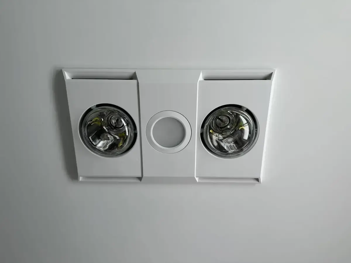 Close-up of a bathroom heat lamp, light and exhaust fan unit installed by Electrikell Qld