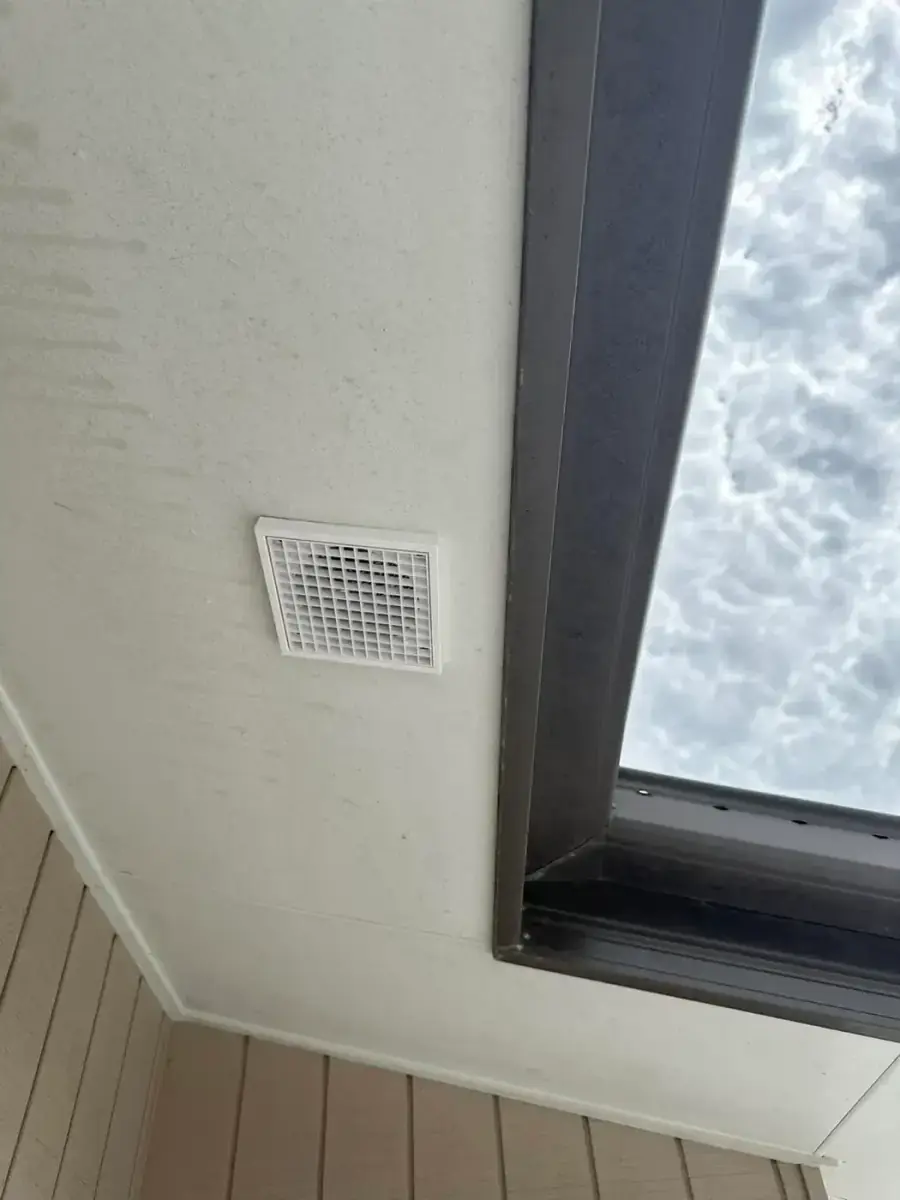 Ceiling exhaust vent installed beside a skylight by Electrikell Qld in a Gladstone region home