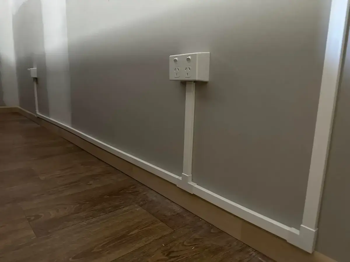 Two new double power points along a skirting with conduit, installed by Electrikell Qld in the Gladstone region